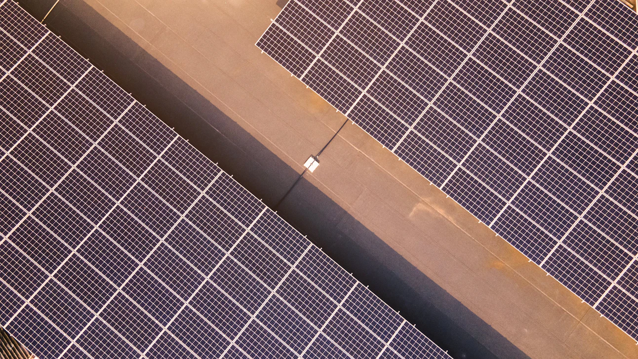 aerial-view-solar-panels-top-building-eco-building-factory-solar-photovoltaic-cell