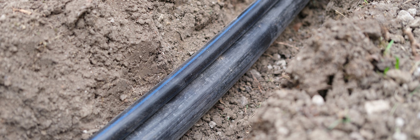 black-pvc-sewer-pipe-optical-fiber-communication-communication-infrastructure-concept