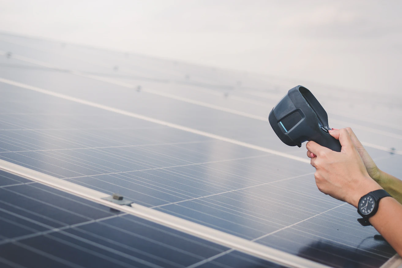 woman-engineer-using-thermal-imager-check-temperature-heat-solar-panel